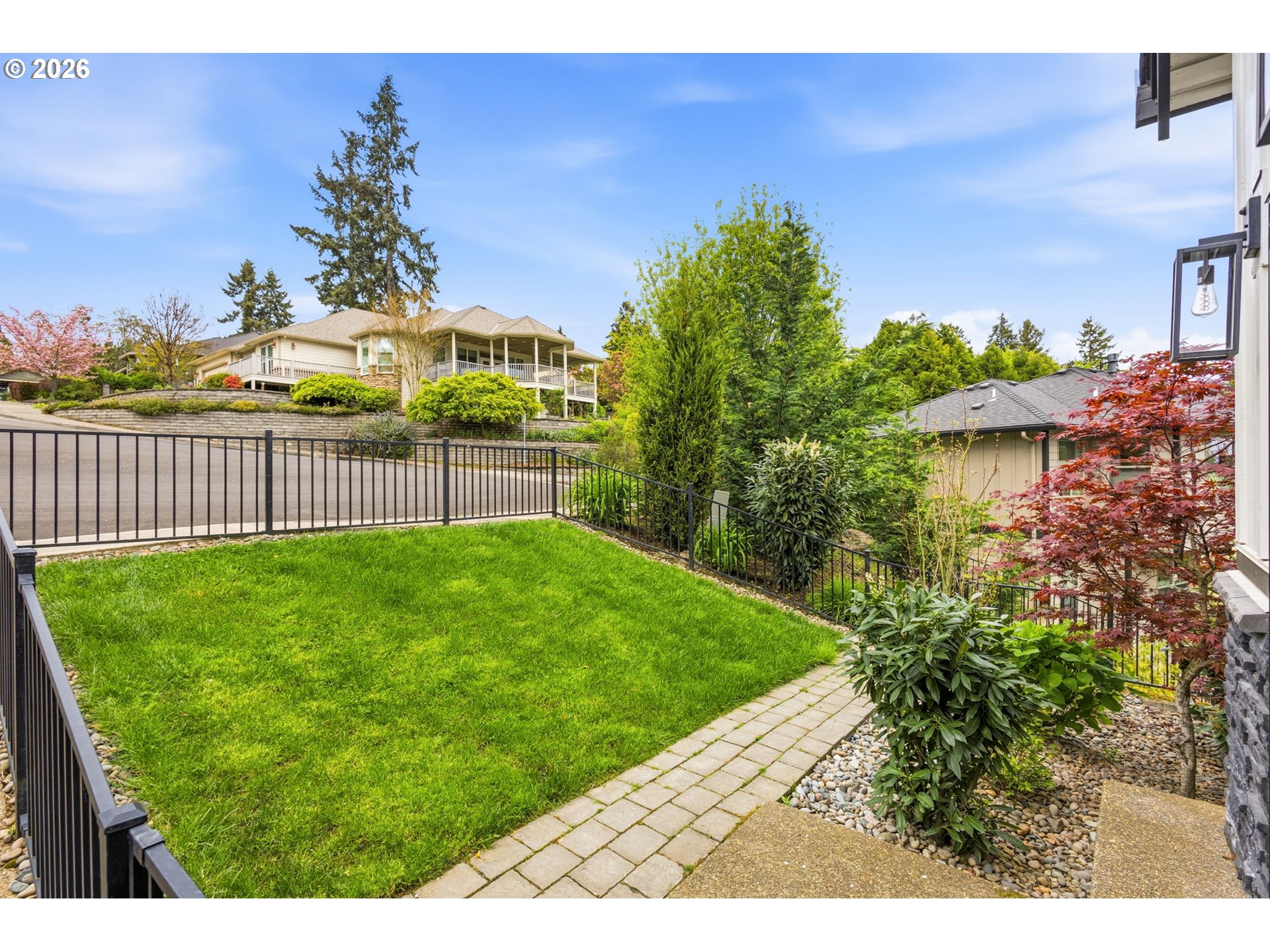 1372 Overview Street Northwest Salem, OR 97304 - Photo 4 of 45 a view of a garden with a building in the background
