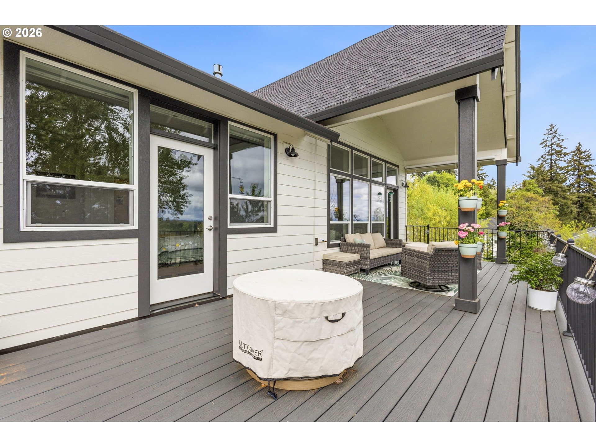 1372 Overview Street Northwest Salem, OR 97304 - Photo 41 of 45 a view of a patio with table and chairs and wooden floor