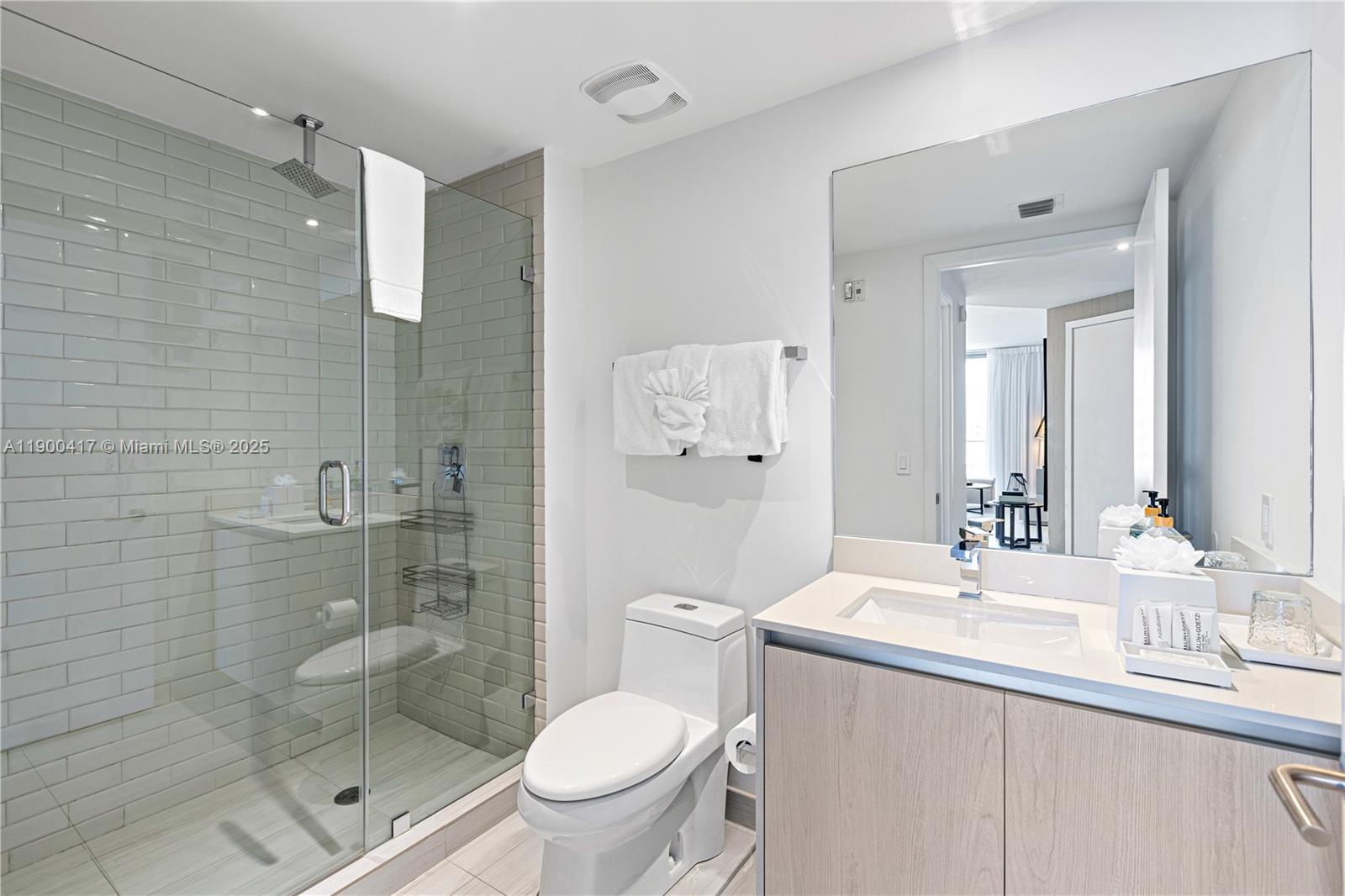 4010 South Ocean Drive, Unit R1701 Hollywood, FL 33019 - Photo 17 of 48 a bathroom with a sink a toilet and shower