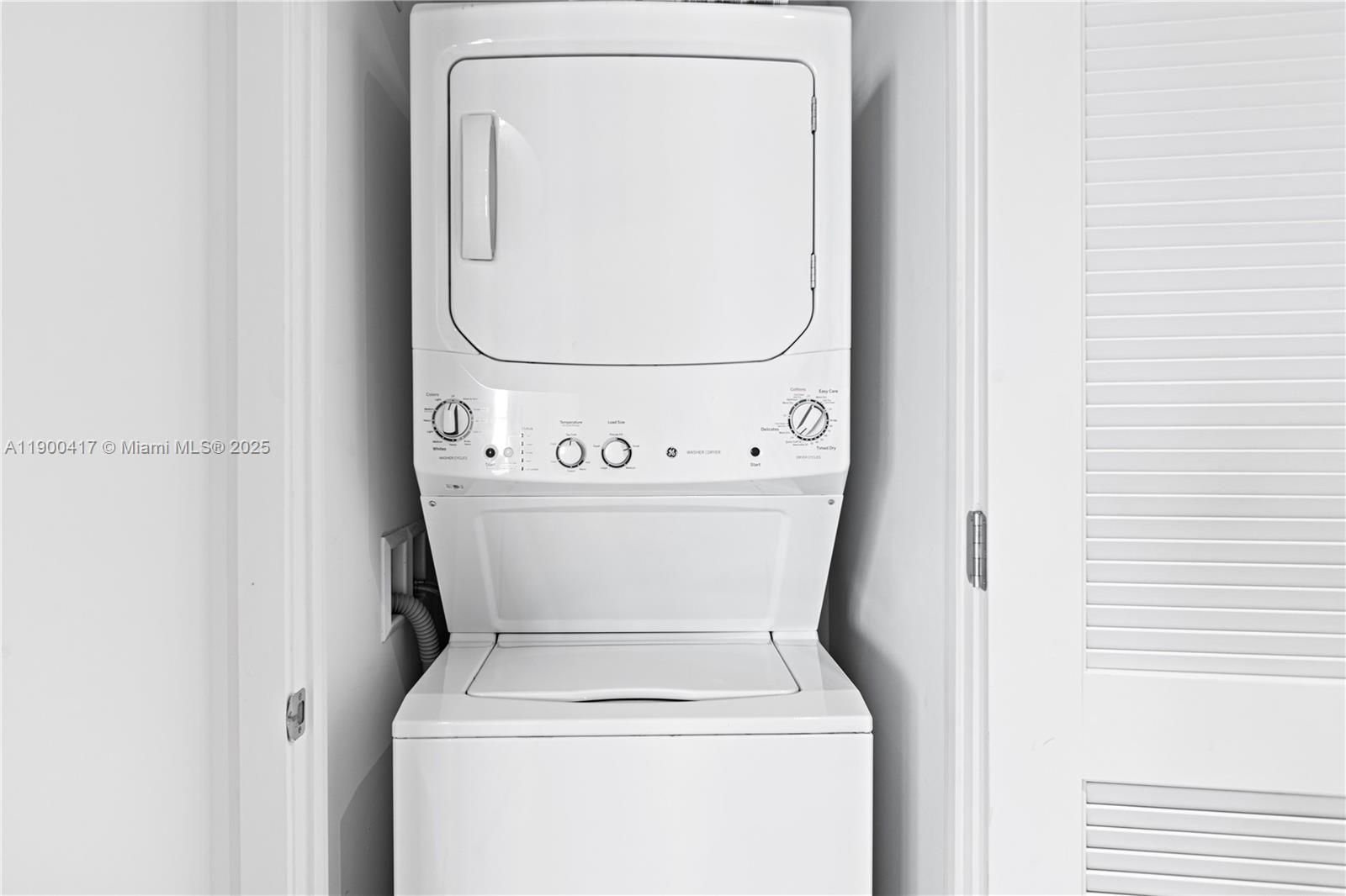 4010 South Ocean Drive, Unit R1701 Hollywood, FL 33019 - Photo 18 of 48 a utility room with dryer and washer