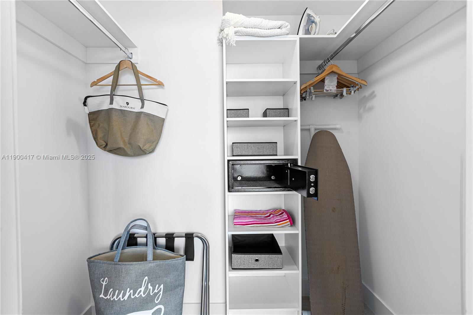 4010 South Ocean Drive, Unit R1701 Hollywood, FL 33019 - Photo 22 of 48 a room with a walk in closet and a sink