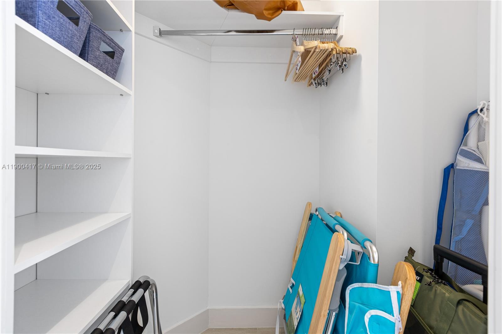 4010 South Ocean Drive, Unit R1701 Hollywood, FL 33019 - Photo 23 of 48 a view of walk in closet with clothes and shoes