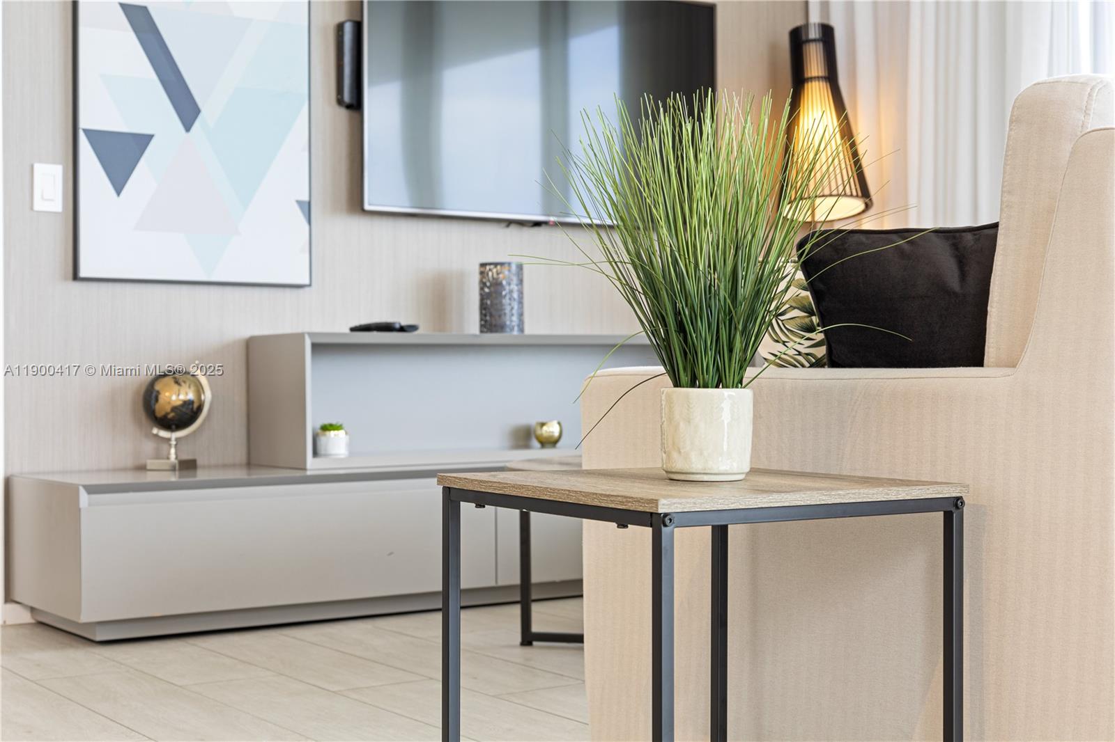 4010 South Ocean Drive, Unit R1701 Hollywood, FL 33019 - Photo 24 of 48 a view of a kitchen with a sink and a potted plant