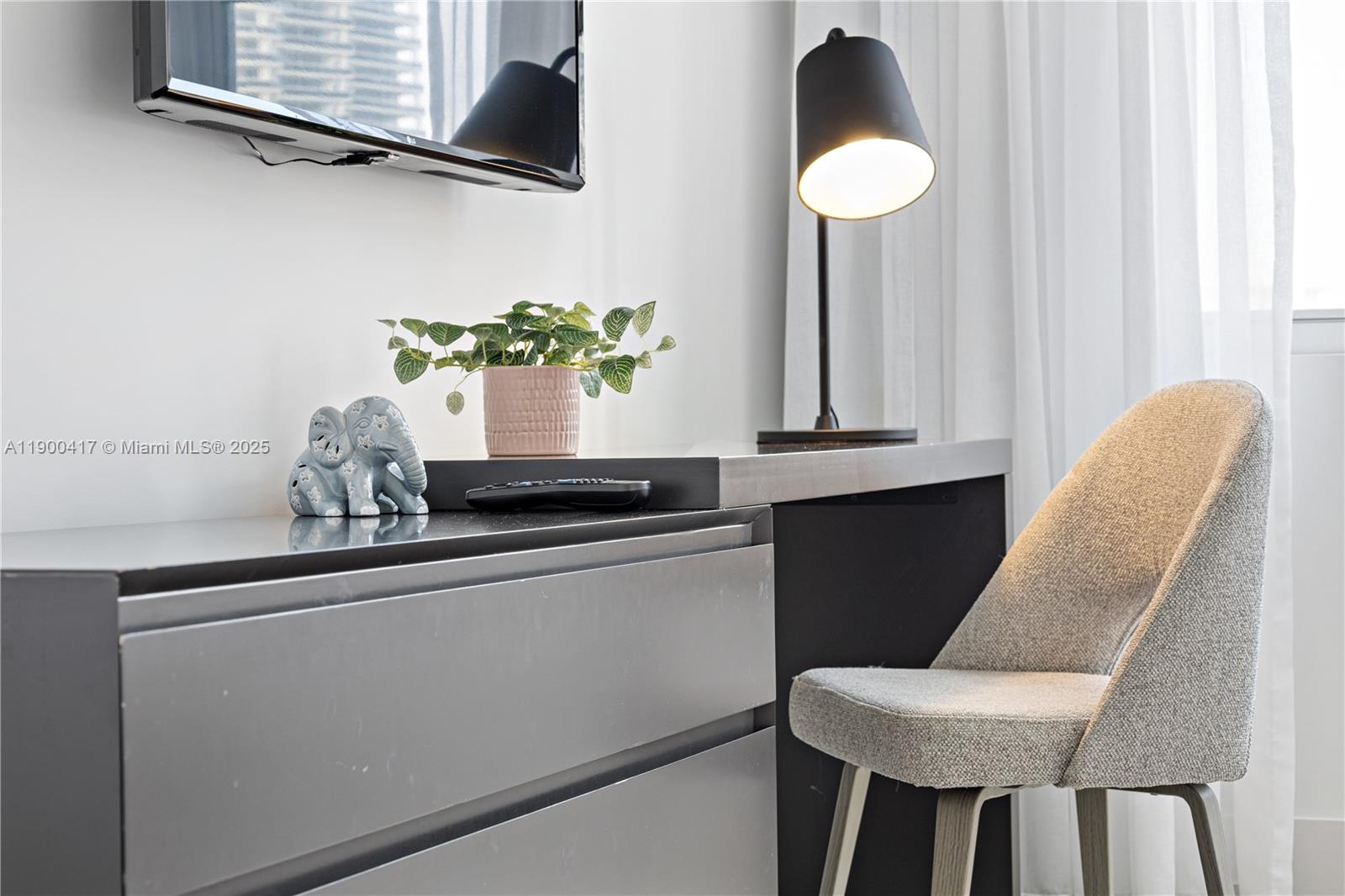 4010 South Ocean Drive, Unit R1701 Hollywood, FL 33019 - Photo 35 of 48 a kitchen with a sink cabinets and a window