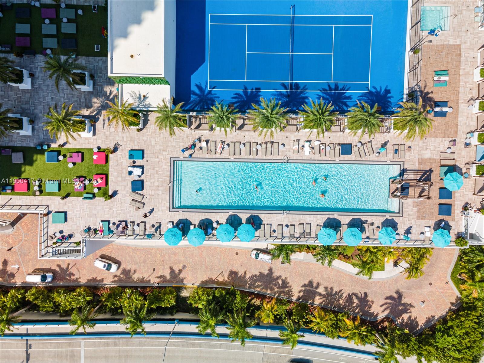4010 South Ocean Drive, Unit R1701 Hollywood, FL 33019 - Photo 47 of 48 a view of a swimming pool with an outdoor space