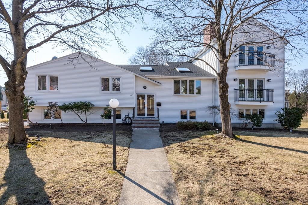 60 Arlo Road Newton, MA 02464 - Photo 1 of 28 a front view of a house with garden