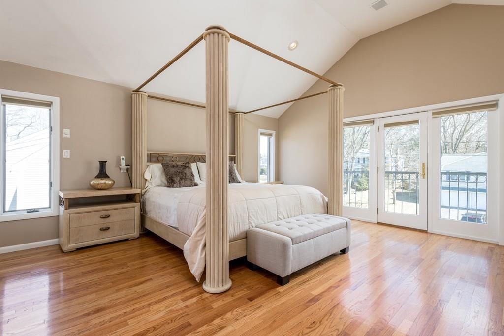 60 Arlo Road Newton, MA 02464 - Photo 18 of 28 a spacious bedroom with a bed and a large window