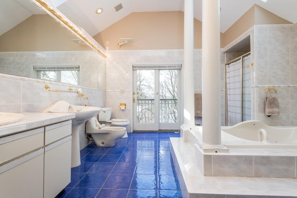 60 Arlo Road Newton, MA 02464 - Photo 20 of 28 a spacious bathroom with a tub sink and mirror