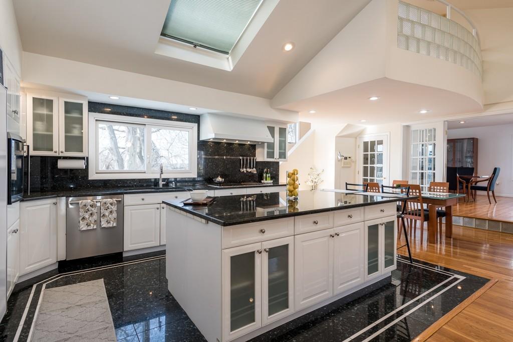 60 Arlo Road Newton, MA 02464 - Photo 2 of 28 a large white kitchen with stainless steel appliances granite countertop a stove and a sink
