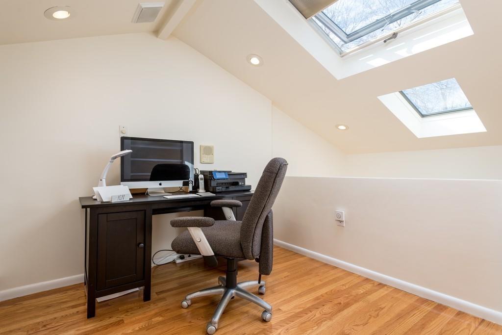 60 Arlo Road Newton, MA 02464 - Photo 21 of 28 a view of a workspace with furniture and wooden floor