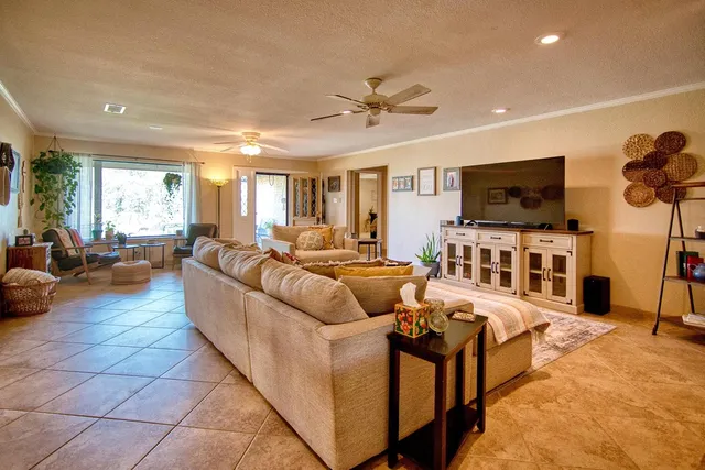 a kitchen with stainless steel appliances granite countertop a stove and cabinets