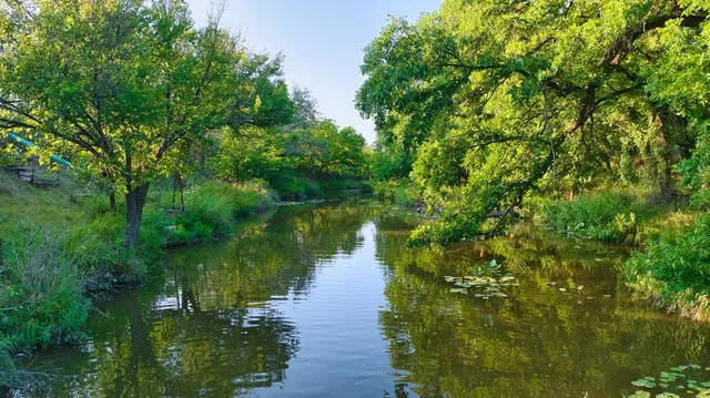 a view of a lake from a balcony
