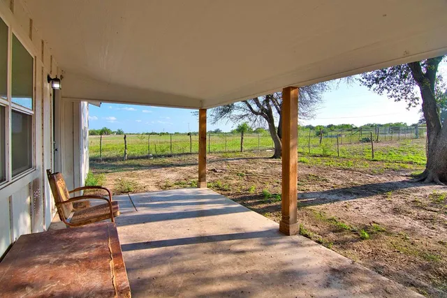 a view of a lake with a building in the background