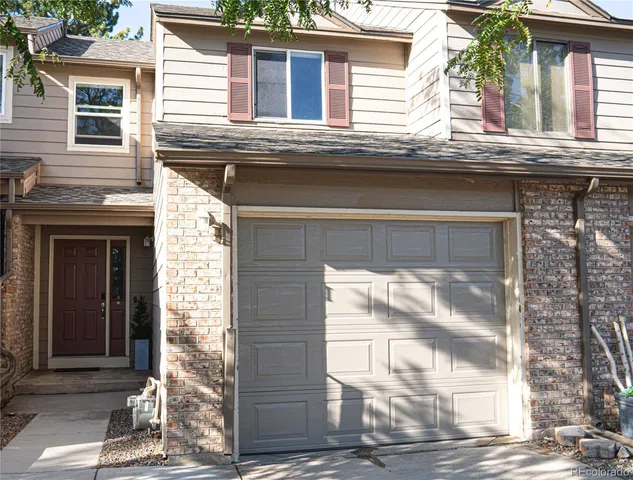 a view of a house with a window and door