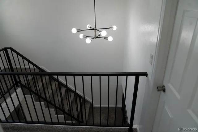 a view of a balcony with ceiling fan