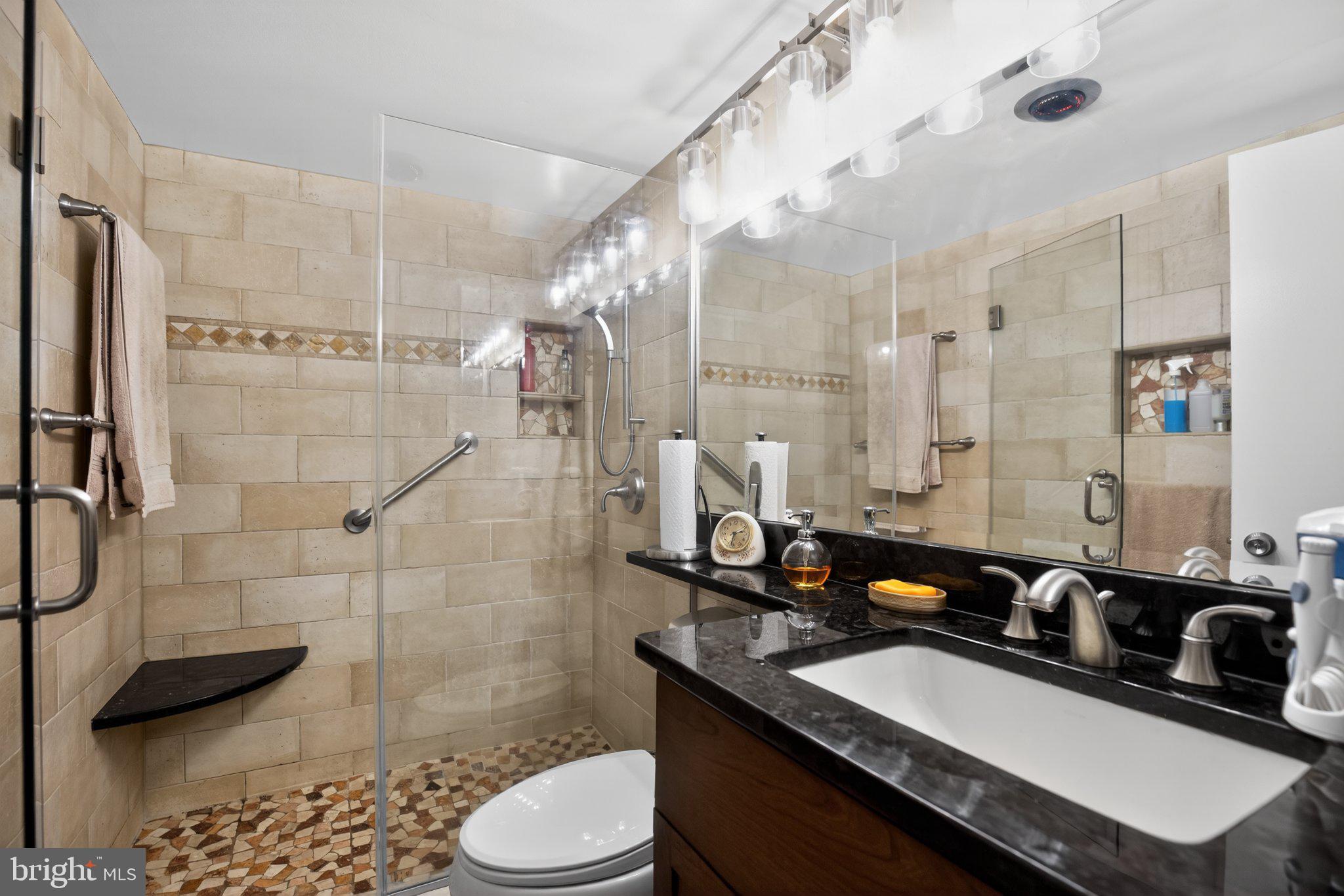 700 7th Street Southwest, Unit 526 Washington, DC 20024 - Photo 20 of 33 Modern elegance in a serene bathroom.