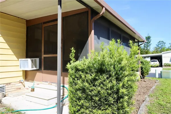 a view of a house with a patio