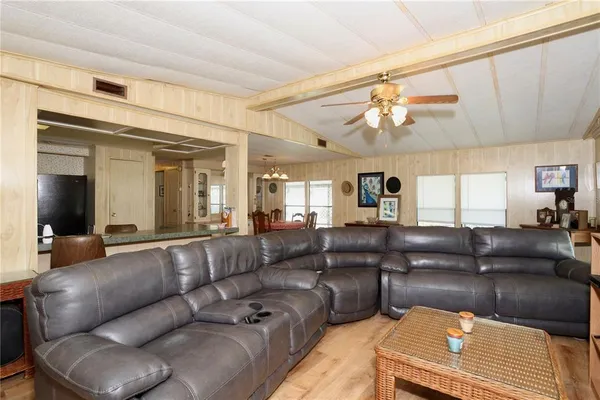 a view of a lake with houses in the back