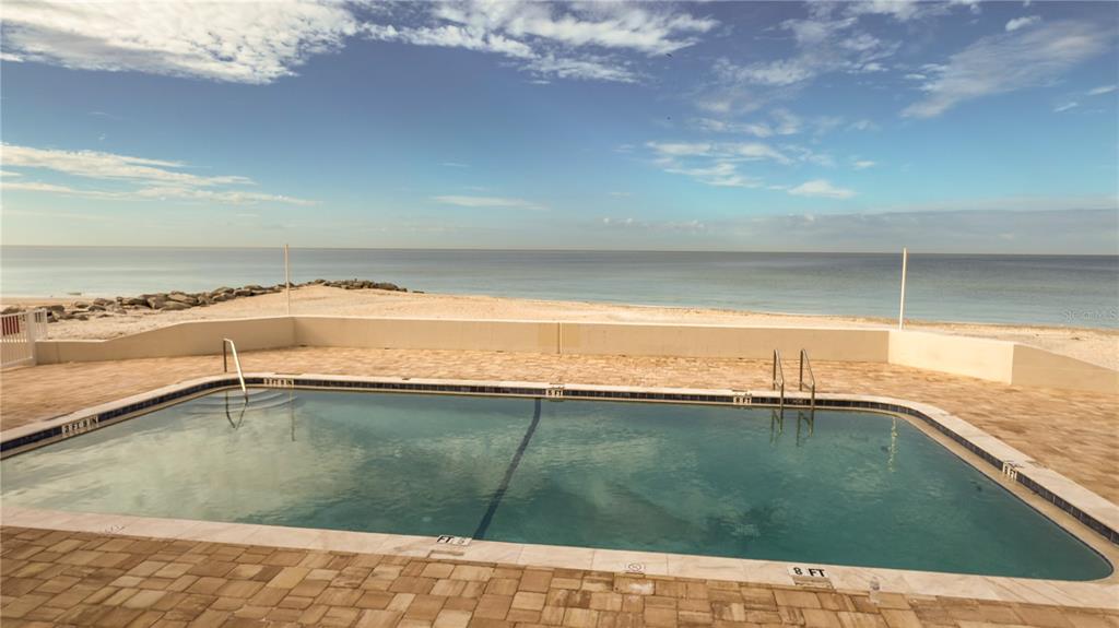 1900 Benjamin Franklin Drive, Unit 201BER Sarasota, FL 34236 - Photo 3 of 21 a view of an ocean and beach