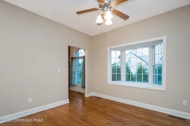 a view of small space with wooden floor
