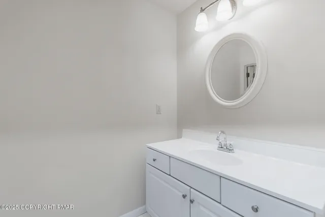 a utility room with multiple dryer and washer