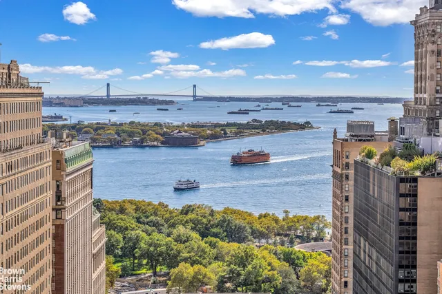 a view of a city and ocean view
