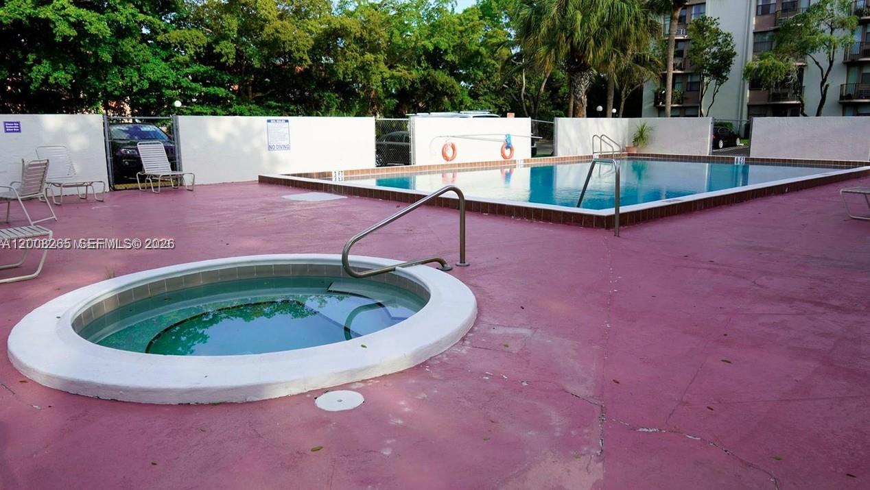 2771 Riverside Drive, Unit 405A Coral Springs, FL 33065 - Photo 19 of 19 a view of outdoor space and yard