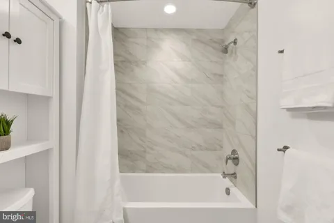 a bathroom with a bathtub