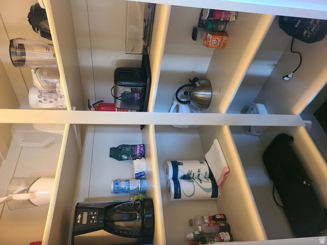 1622 Canyon Tree Drive St. George, UT 84770 - Photo 30 of 34 Custom built-in shelving with integrated lighting