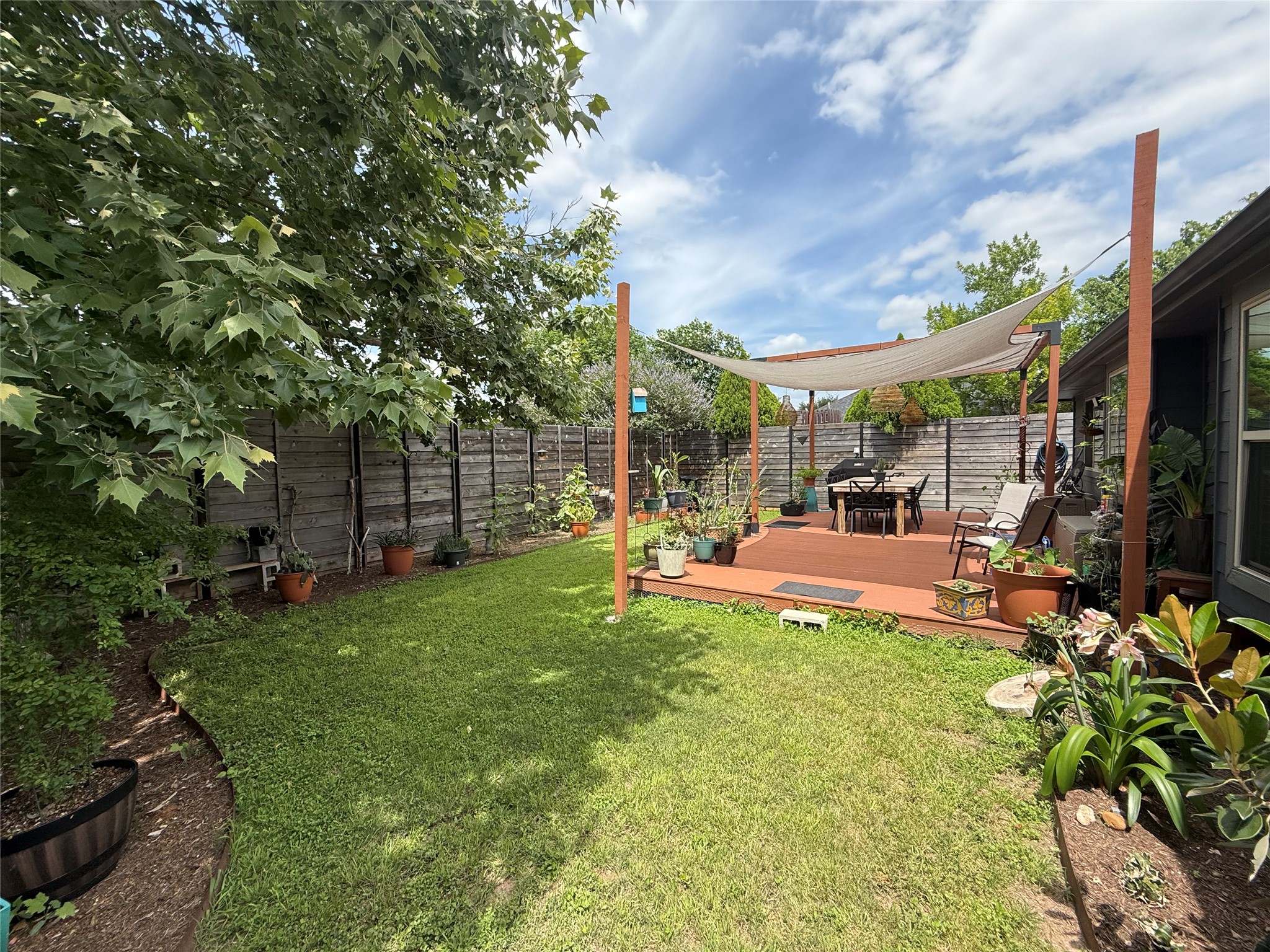 7108 Hester Road Austin, TX 78725 - Photo 18 of 25 a view of a backyard with sitting area