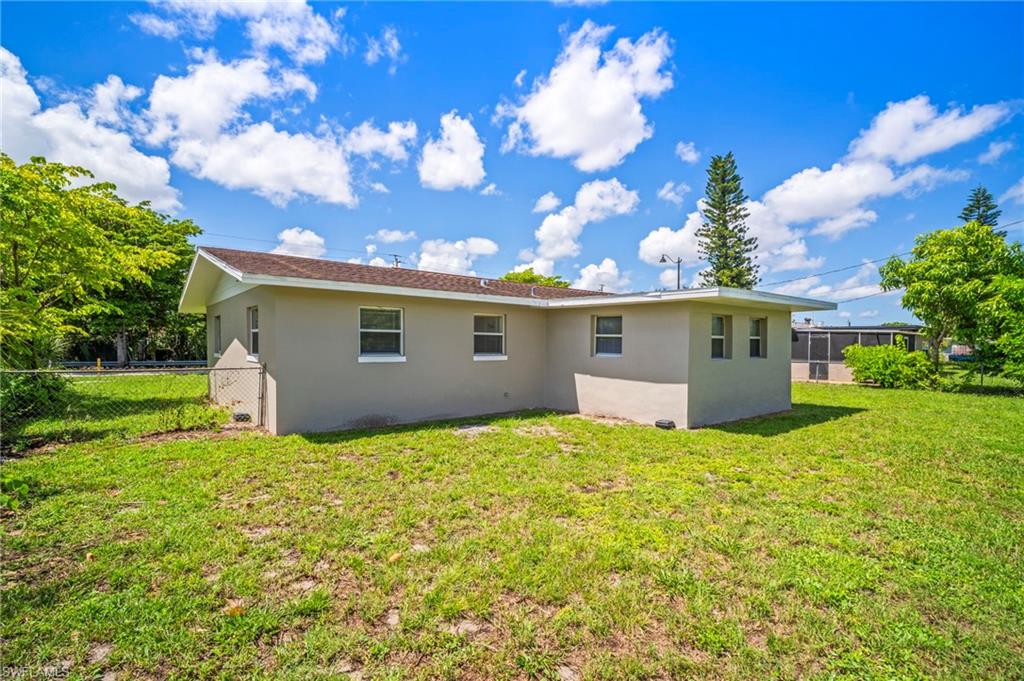 2259 Carrell Road Fort Myers, FL 33901 - Photo 27 of 28 a view of a house with backyard