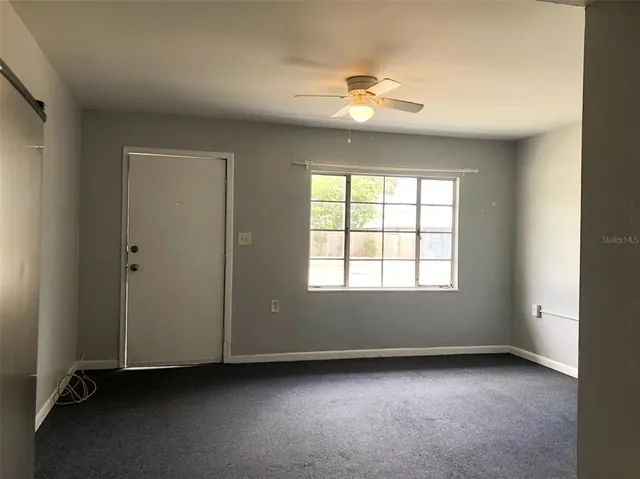 an empty room with window