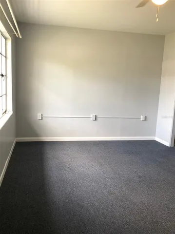 a view of a room with an empty space