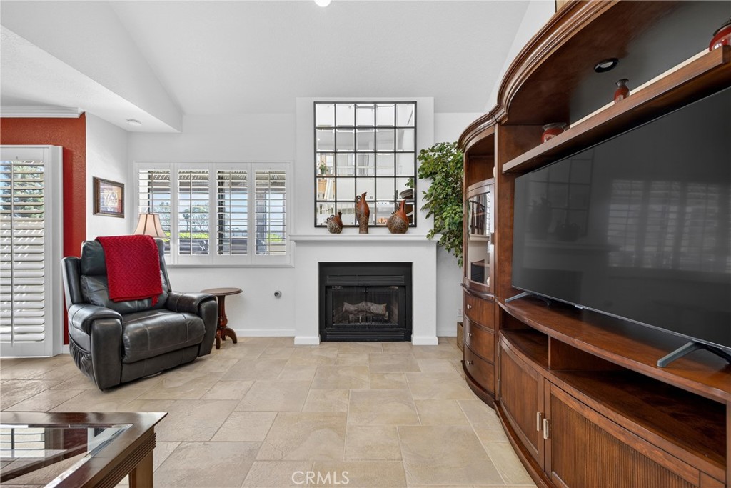 832 Trinity Lane Claremont, CA 91711 - Photo 11 of 51 a living room with furniture and a fireplace