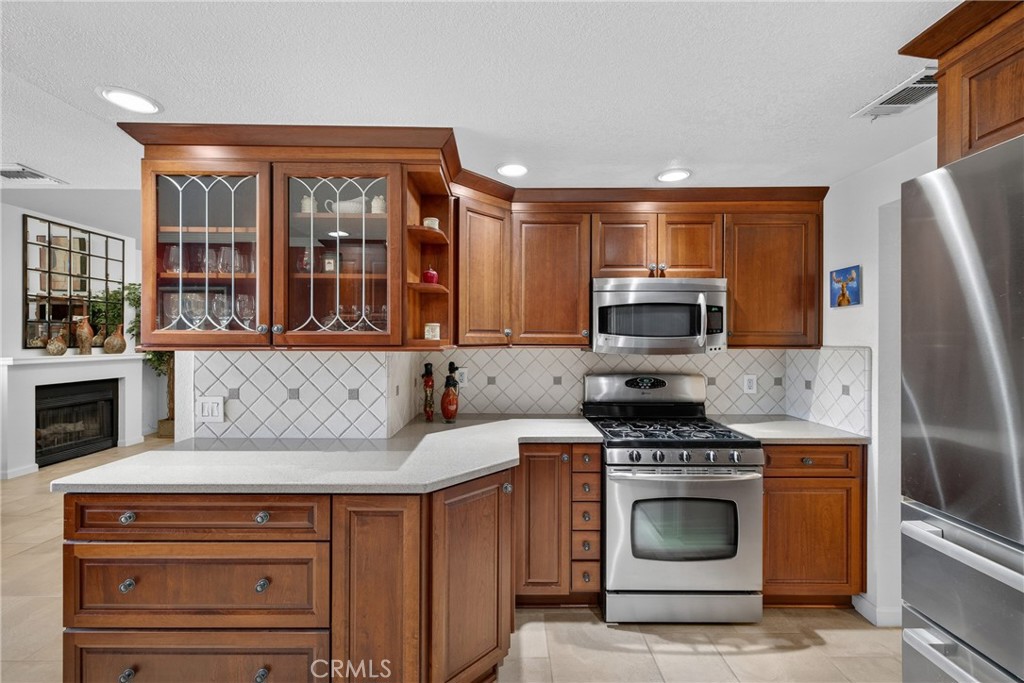 832 Trinity Lane Claremont, CA 91711 - Photo 18 of 51 a kitchen with a stove and a sink