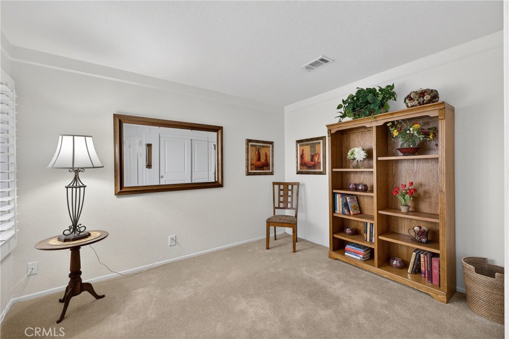 832 Trinity Lane Claremont, CA 91711 - Photo 20 of 51 a room with furniture and a window