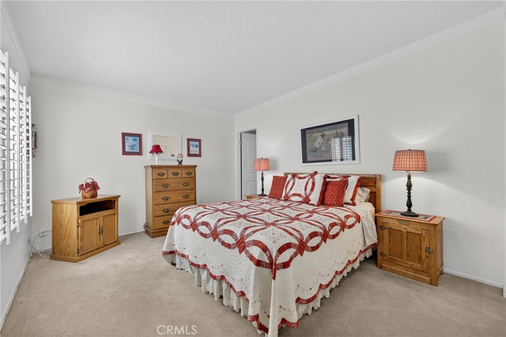 832 Trinity Lane Claremont, CA 91711 - Photo 33 of 51 a bedroom with a bed and a lamp