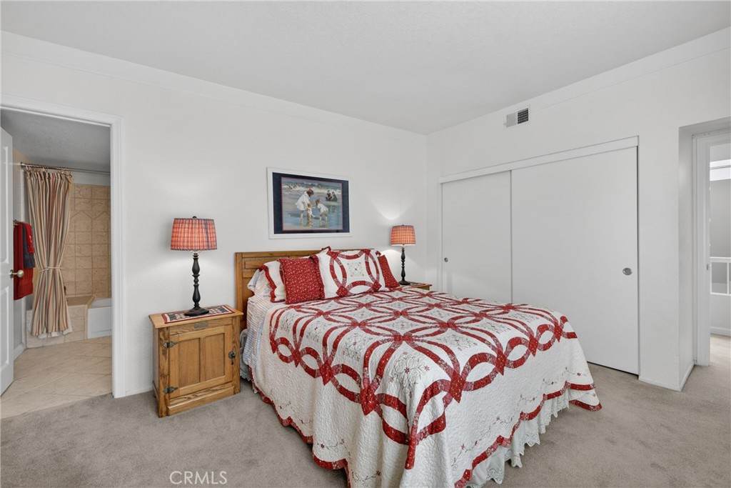 832 Trinity Lane Claremont, CA 91711 - Photo 34 of 51 a bedroom with a bed and a lamp