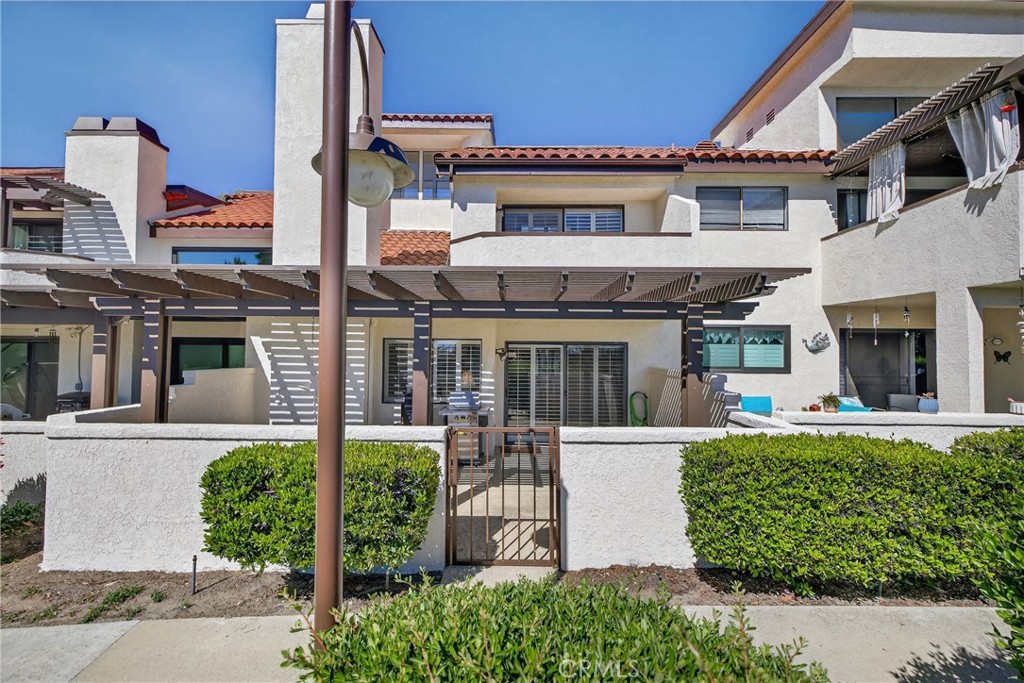 832 Trinity Lane Claremont, CA 91711 - Photo 36 of 51 front view of a building with a garden