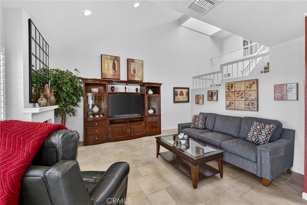 832 Trinity Lane Claremont, CA 91711 - Photo 10 of 51 a living room with furniture and a flat screen tv