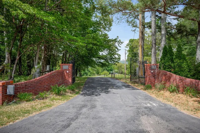a view of a bedroom with a large bed and a window