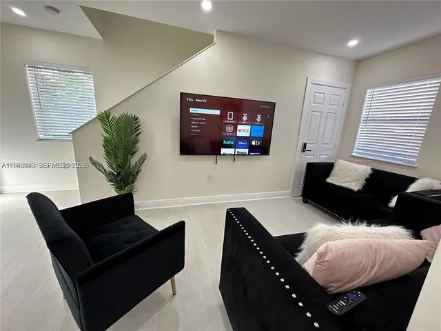 a view of a patio with swimming pool