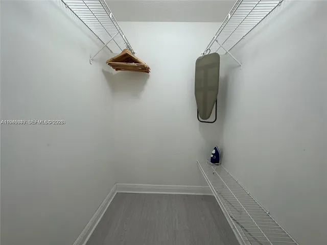 a view of a workspace with furniture