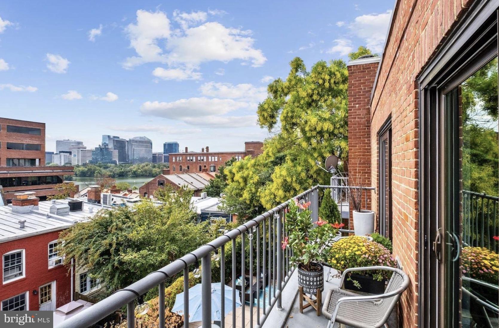 3210 Grace Street Northwest, Unit 308 Washington, DC 20007 - Photo 11 of 11 a balcony with an outdoor space