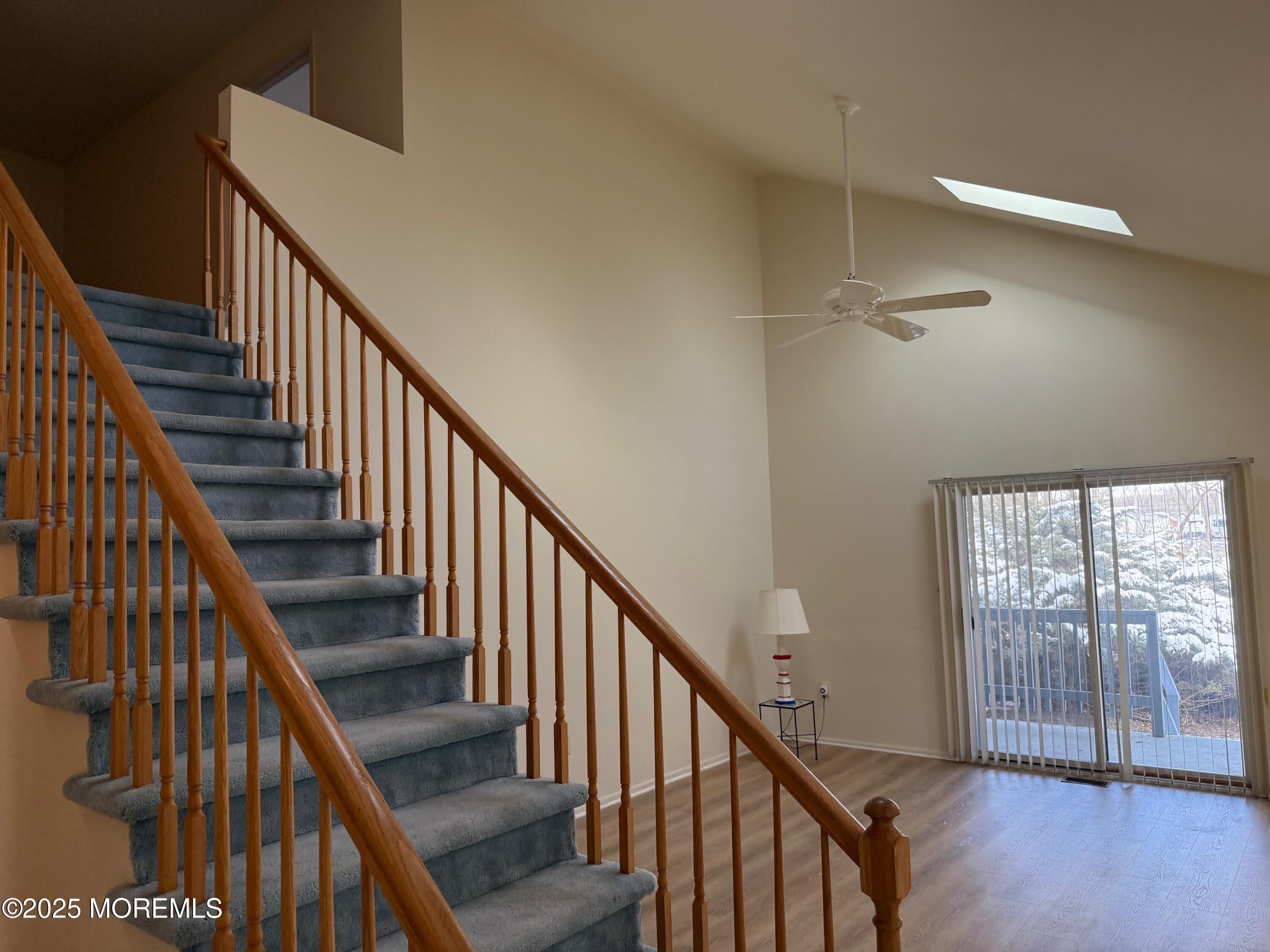 2 Whitesands Way Little Silver, NJ 07739 - Photo 5 of 9 a view of staircase with wooden floor and white walls