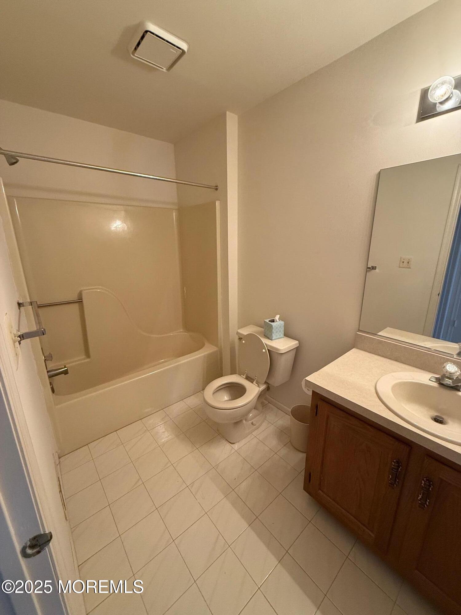 2 Whitesands Way Little Silver, NJ 07739 - Photo 8 of 9 a bathroom with a granite countertop sink a toilet and shower