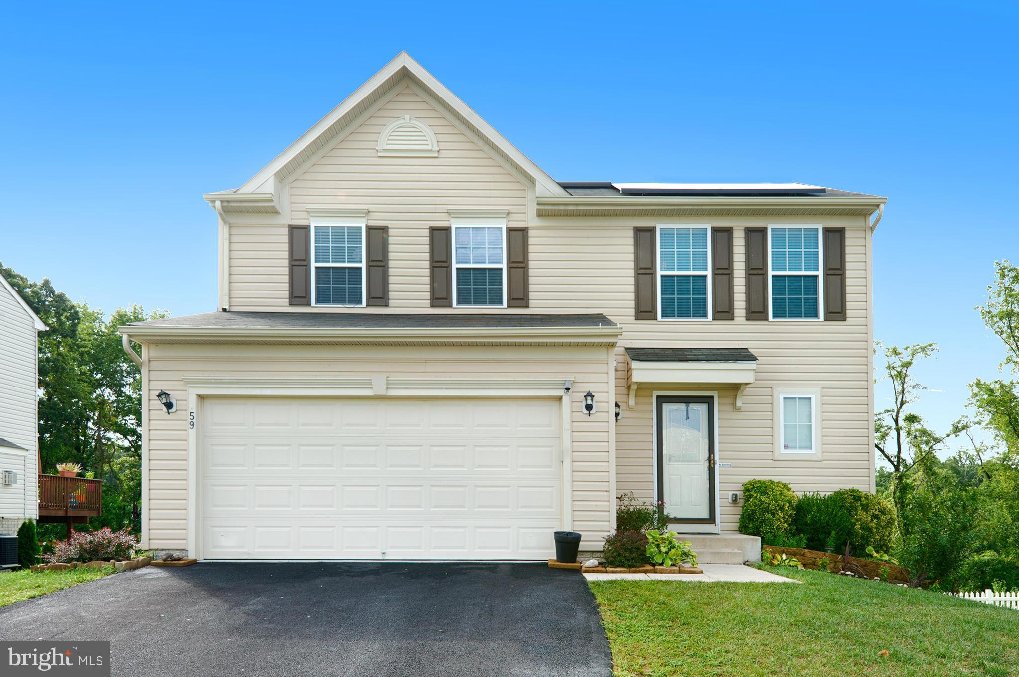 59 Haverhill Road Joppa, MD 21085 - Photo 2 of 28 front view of a house with a yard
