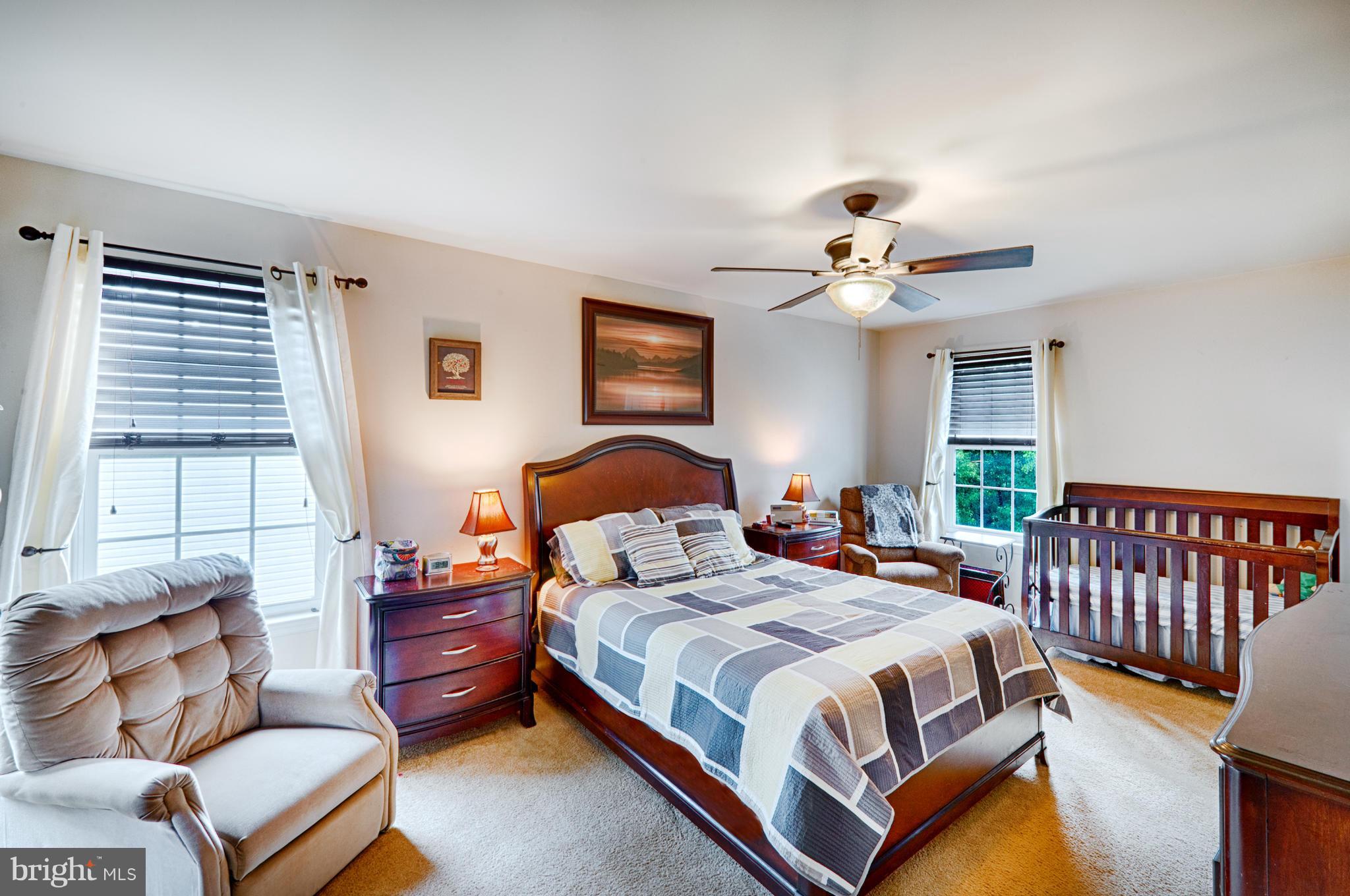 59 Haverhill Road Joppa, MD 21085 - Photo 13 of 28 a bedroom with bed and window