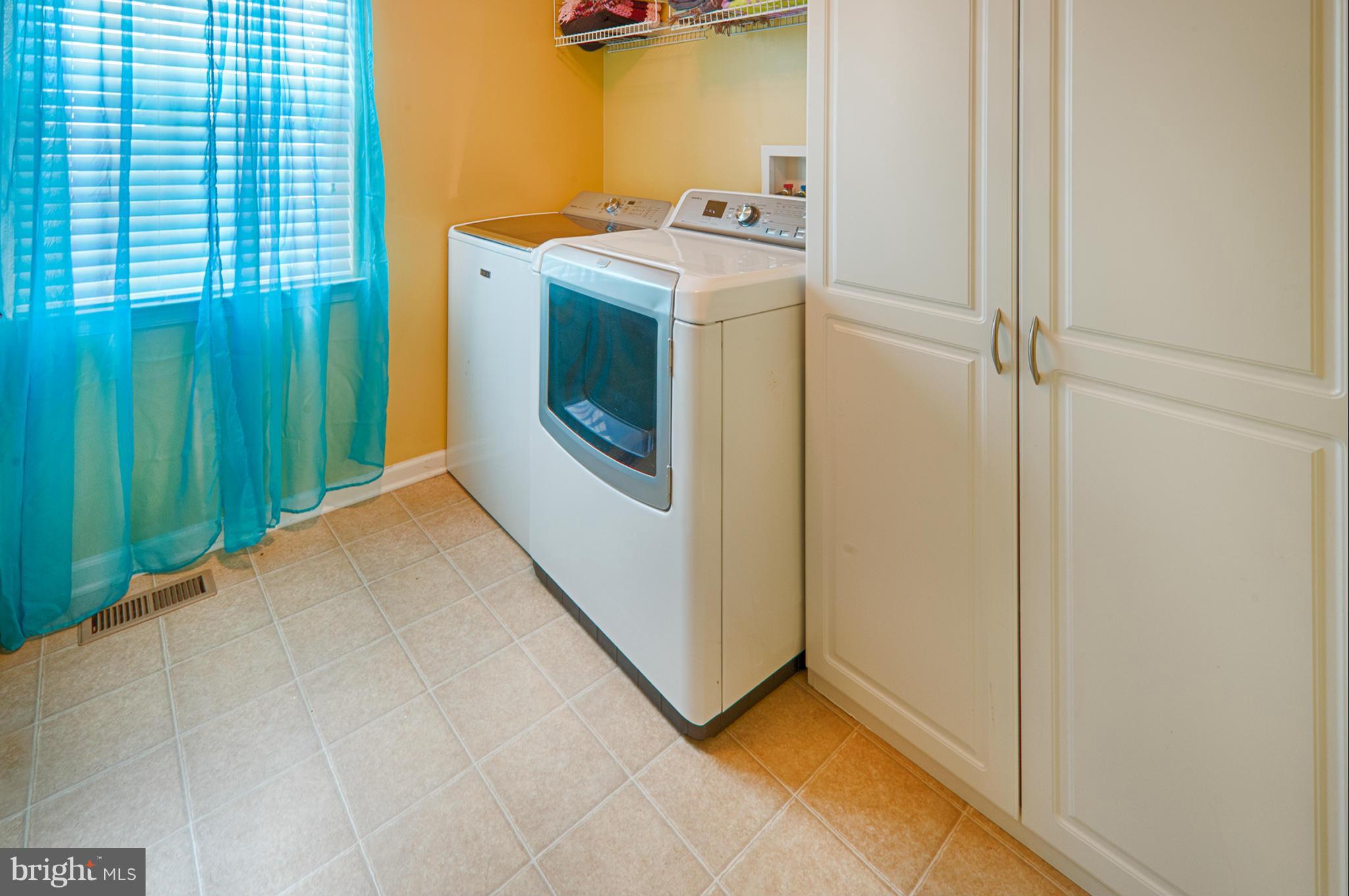 59 Haverhill Road Joppa, MD 21085 - Photo 16 of 28 a utility room with dryer and washer