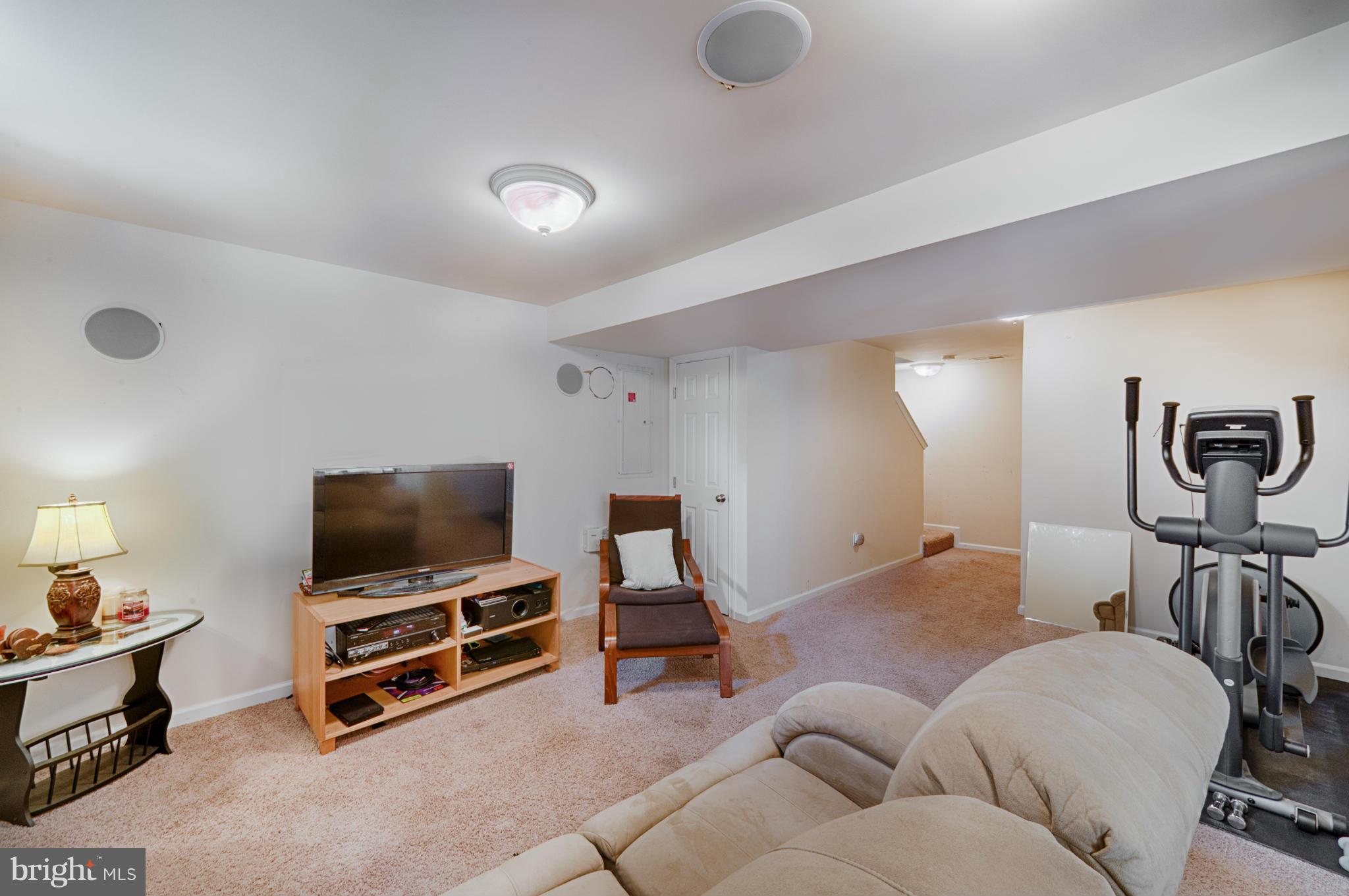 59 Haverhill Road Joppa, MD 21085 - Photo 22 of 28 a living room with furniture and a flat screen tv